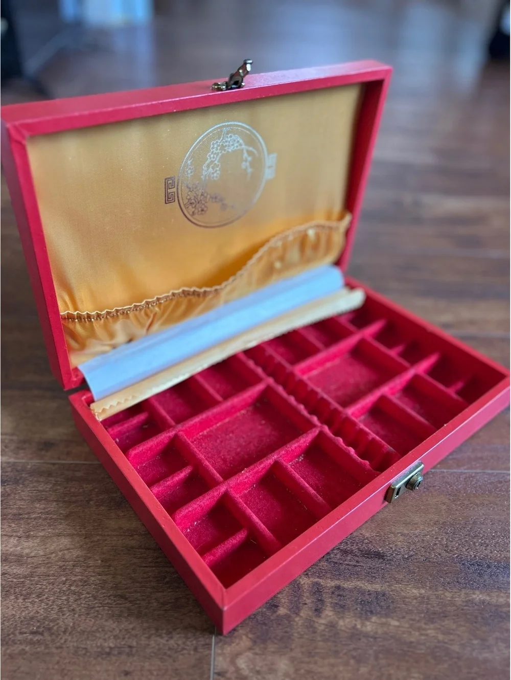 Vintage Red Jewelry Box with Gold Embossed Design and Multiple Compartments